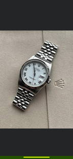 USED 36 MM ROMAN NUMERAL ROLEX DATEJUST IN EXCELLENT CONDITION COMES WITH BOX & APPRAISAL: USED 36 MM ROMAN NUMERAL ROLEX DATEJUST IN EXCELLENT CONDITION COMES WITH BOX & APPRAISAL -- USED 36 MM ROMAN NUMERAL ROLEX DATEJUST IN EXCELLENT CONDITION COMES WITH BOX & APPRAISAL #PAPPS10649v8