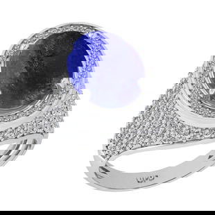 8.90 Ctw I2/I3 Tanaznite And Diamond 14K White Gold Engagement Ring: 8.90 Ctw I2/I3 Tanaznite And Diamond 14K White Gold Engagement Ring -- Center Stone Weight : 7.30 Ctw ( Oval Cab ) Center Stone Color : Tanaznite Stone Setting : Prong Side Diamond Weight Of Ctw1.60