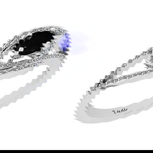 1.41 Ctw I2/I3 Blue Sapphire And Diamond 14k White Gold Ring: 1.41 Ctw I2/I3 Blue Sapphire And Diamond 14k White Gold Ring -- Center Stone Weight ; 1.00 Ctw ( 1 Pec Round) Center Stone Color : Blue Sapphire Center Stone Setting ; Prong Side Diamond Weight of