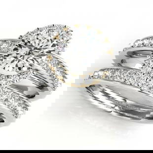 CERTIFIED 14KT TWO TONE GOLD 1.05 CTW J-K/VS-SI1 DIAMOND HALO BRIDAL SET: CERTIFIED 14KT TWO TONE GOLD 1.05 CTW J-K/VS-SI1 DIAMOND HALO BRIDAL SET -- CERTIFIED 14KT TWO TONE GOLD 1.05 CTW J-K/VS-SI1 DIAMOND HALO BRIDAL SET (CENTER STONE DAIMOND .90 CTW J-K/VS-SI1) please