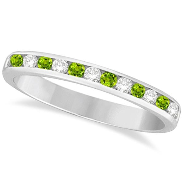 Peridot and Diamond Semi-Eternity Channel Ring 14k White Gold 1.00 ctw: Peridot and Diamond Semi-Eternity Channel Ring 14k White Gold 1.00 ctw -- CENTER STONE; Peridot CENTER STONE CLARITY; CENTER STONE COLOR; Green CENTER STONE SETTING; Channel SIDE STONE CLARITY; SI SID