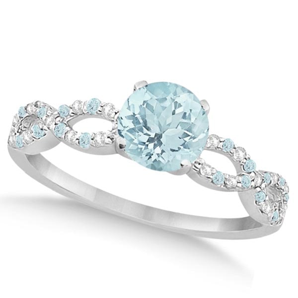 Diamond and Aquamarine Infinity Engagement Ring 14K White Gold 1.40ctw: Diamond and Aquamarine Infinity Engagement Ring 14K White Gold 1.40ctw -- CENTER STONE 1.00 CTW ; Aquamarine CENTER STONE CLARITY; Eye Clean CENTER STONE COLOR; Blue CENTER STONE SETTING; Prong SIDE S