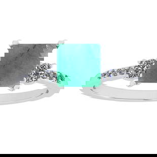 1.53 Ctw VS/SI1 Emerald And Diamond 14K White Gold Cocktail Ring: Center Stone Weight : 1.25 Ctw ( Princess Cut ) Center Stone Color : Emerald Stone Setting : Prong Side Diamond Weight Of Ctw 0.28 Ctw Side Stone Color : J-K Stone Clarity : VS/SI1 Stone Setting : Pro