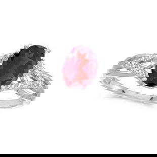 Oval Ruby and Diamond Cocktail Ring in 14K White Gold 1.52 ctw: CENTER STONE; Ruby CENTER STONE CLARITY; CENTER STONE COLOR; CENTER STONE SETTING; Prong SIDE STONE CLARITY; SI SIDE STONE COLOR; I-J SIDE STONE SETTING; Prong ctw OF SIDE STONE: 0.02 SIDE STONE