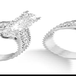 Cathedral Style Round Diamond Engagement Ring 14k White Gold 3.00ctw: CENTER STONE; Diamond (2.00) CENTER STONE CLARITY; SI1 - SI2 CENTER STONE COLOR; J-K CENTER STONE SETTING; Prong SIDE STONE CLARITY; SI1 - SI2 SIDE STONE COLOR; J-K SIDE STONE SETTING; Pave ctw OF SID