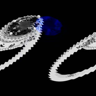4.41 Ctw VS/SI1 Tanzanite and Diamond 14K White Gold Engagement Ring: Center Stone Weight : 3.89 Ctw ( Oval Cut) Center stone Color :-Tanzanite Center Stone Setting : Prong Side Stone Weight Of Ctw 0.52 Ctw Side Stone Color : J-K Stone Clarity : VS/SI1 Stone Setting : P