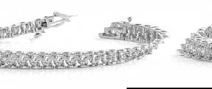 14KT WHITE GOLD .50 CTW G-H VS2/SI1 CLASSIC PRONG ILLUSION SET DIAMOND TENN