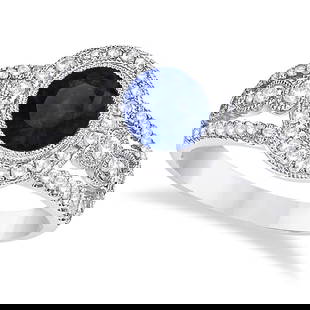 Vintage Style Blue Sapphire and Diamond Ring 14k White Gold 1.50ctw: CENTER STONE; Sapphire CENTER STONE CLARITY; CENTER STONE COLOR; Blue CENTER STONE SETTING; Bezel SIDE STONE CLARITY; SI SIDE STONE COLOR; J-K SIDE STONE SETTING; Prong ctw OF SIDE STONE: 0.4 SIDE STO