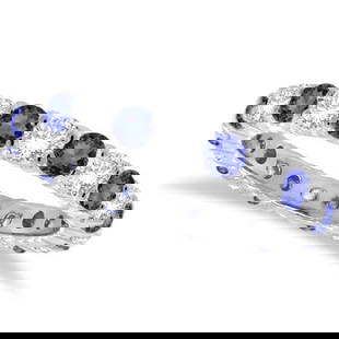 Tanzanite and Diamond Eternity Ring Band 14k White Gold 1.07ctw: CENTER STONE; Tanzanite CENTER STONE CLARITY; CENTER STONE COLOR; CENTER STONE SETTING; Prong SIDE STONE CLARITY; SI SIDE STONE COLOR; J-K SIDE STONE SETTING; Prong ctw OF SIDE STONE: 0.5 SIDE STONE Q