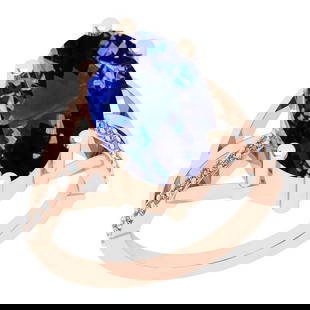 8.00 Ctw VS/SI1 Tanzanite And Diamond 18K Rose Gold Ring: Center Stone Weight : 7.84 Ctw (Oval Cut) Center Stone Color :-Tanzanite Center Stone Setting : Prong Side Stone Weight Of Ctw 0.16 Ctw Side Stone Color : G-H Stone Clarity : VS/SI1 Stone Setting : Pr