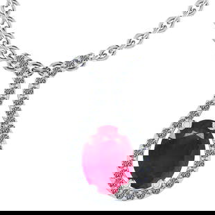 17.07 CtwSI2/I1 Ruby And Diamond 14K White Gold Pendant Necklace: Center Stone Weight : 13.57 Ctw ( Oval Cut ) Center Stone Color : Ruby Stone Setting : Prong Side Diamond Weight Of Ctw 3.50 Ctw Side Stone Color : J-K Stone Clarity :SI2/I1 Stone Setting : Prong Meta