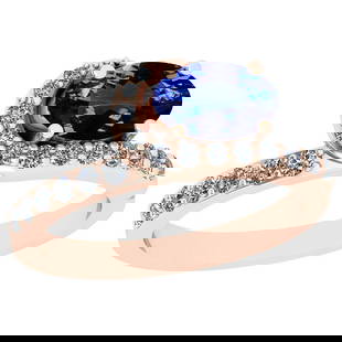 2.63 Ctw VS/SI1 Tanzanite And Diamond 18K Rose Gold Promises Ring: Center Stone Weight : 2.32 Ctw (Oval Cut) Center Stone Color :-Tanzanite Center Stone Setting : Prong Side Stone Weight Of Ctw 0.31 Ctw Side Stone Color : G-H Stone Clarity : VS/SI1 Stone Setting : Pr