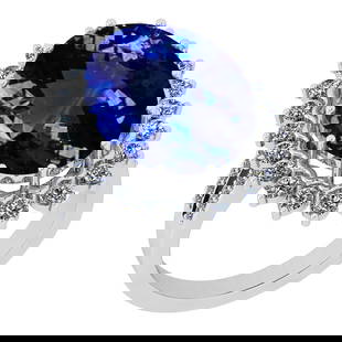 9.27 Ctw VS/SI1 Tanzanite And Diamond 18K White Gold Victorian Style Engage: Center Stone Weight : 8.32 Ctw (Oval Cut) Center Stone Color :-Tanzanite Center Stone Setting : Prong Side Stone Weight Of Ctw 0.95 Ctw Side Stone Color : G-H Stone Clarity : VS/SI1 Stone Setting : Pr