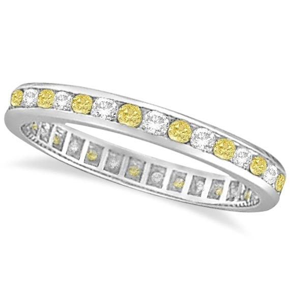 Channel-Set Yellow and White Diamond Eternity Ring 14k W Gold 1.00ctw: CENTER STONE; Diamond CENTER STONE CLARITY; SI CENTER STONE COLOR; Fancy Yellow CENTER STONE SETTING; Channel SIDE STONE CLARITY; SI SIDE STONE COLOR; J-K SIDE STONE SETTING; Channel ctw OF SIDE STONE