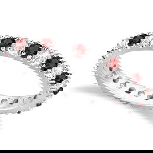 Diamond and Garnet Eternity Band Stackable Ring 14K White Gold 1.00 ctw: CENTER STONE; Garnet CENTER STONE CLARITY; CENTER STONE COLOR; Red CENTER STONE SETTING; Prong SIDE STONE CLARITY; SI SIDE STONE COLOR; J-K SIDE STONE SETTING; Prong ctw OF SIDE STONE: 0.50 SIDE