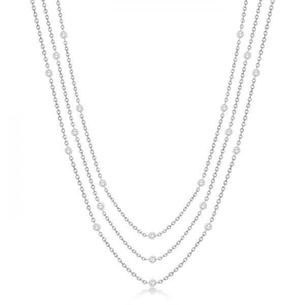 Three-Strand Diamond Station Necklace in 14k White Gold (3.01ct): METAL TYPE: 14k White Gold ;TOTAL CARAT WEIGHT: 3.01 ;NAME OF CENTER STONE: Diamond ;CENTER STONE SHAPE: Round ;CENTER STONE CLARITY: SI1-SI2 ;CENTER STONE COLOR: G-h ;CENTER STONE SETTING: Bezel