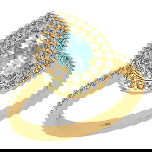 1.17 Ctw SI2/I1 Aquamarine And Diamond 14k Yellow Gold Ring: Center Stone Weight : 0.60 Ctw (Pear Cut) Center Stone Color :-Aquamarine Center Stone Setting : Prong Side Stone Weight Of Ctw 0.57 Ctw Side Stone Color : J-K Stone Clarity : SI2/I1 Stone Setting :