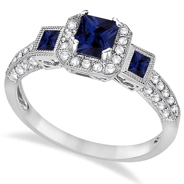 Blue Sapphire and Diamond Engagement Ring 14k White Gold 2.45ctw: CENTER STONE; Sapphire 2.00 CENTER STONE CLARITY; CENTER STONE COLOR; Blue,Blue CENTER STONE SETTING; Prong,Bezel SIDE STONE CLARITY; SI SIDE STONE COLOR; J-K SIDE STONE SETTING; Prong ctw OF SIDE STO