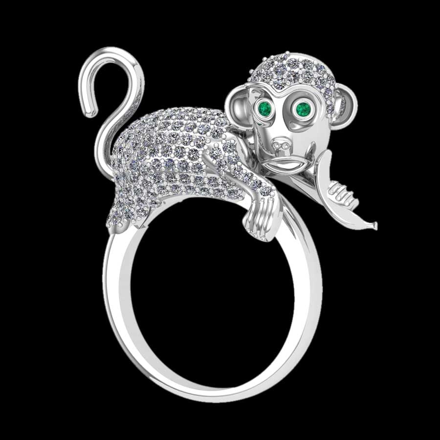 1.60 Ctw SI2/I1 Diamond 18K White Gold Monkey Ring: Eye Stone Weight :- 0.02 ctw Eye stone Color :-Emereld Total Diamond Weight : 1.58 Ctw (Round cut) Center Diamond Color :- J-K Center Clarity : SI2/I1 Stone Setting : Prong Metal Weight : Approx 17.50