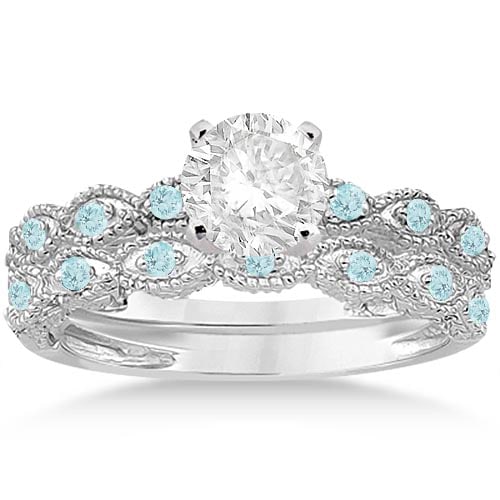 Antique style Aquamarine Bridal Set Marquise Shape 14K White Gold 1.26ctw: CENTER STONE; 0.90 ctw CENTER STONE CLARITY; Eye Clean CENTER STONE COLOR; Blue CENTER STONE SETTING; Pave SIDE STONE CLARITY; Eye Clean SIDE STONE COLOR; Blue SIDE STONE SETTING; Pave ctw OF SIDE