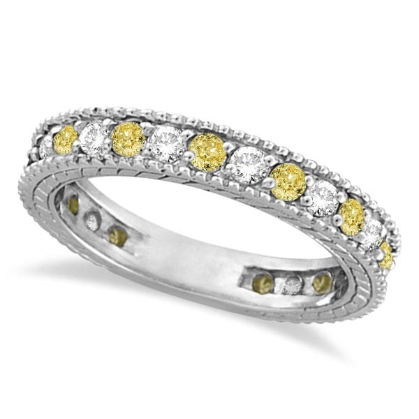 Fancy Yellow Canary and White Diamond Eternity Ring 14k Gold 1.00ctw: CENTER STONE; Diamond CENTER STONE CLARITY; SI1-SI2 CENTER STONE COLOR; Yellow CENTER STONE SETTING; Prong SIDE STONE CLARITY; SI1-SI2 SIDE STONE COLOR; J-K SIDE STONE SETTING; Prong ctw OF SIDE STONE