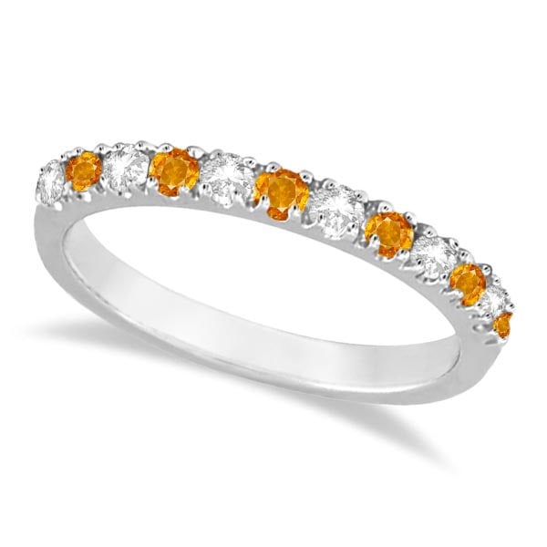 Diamond and Citrine Ring Guard Stackable Band 14k White Gold 0.32ctw: CENTER STONE; Citrine CENTER STONE CLARITY; CENTER STONE COLOR; Orange CENTER STONE SETTING; Prong SIDE STONE CLARITY; SI SIDE STONE COLOR; J-K SIDE STONE SETTING; Prong ctw OF SIDE STONE: 0.12 SIDE