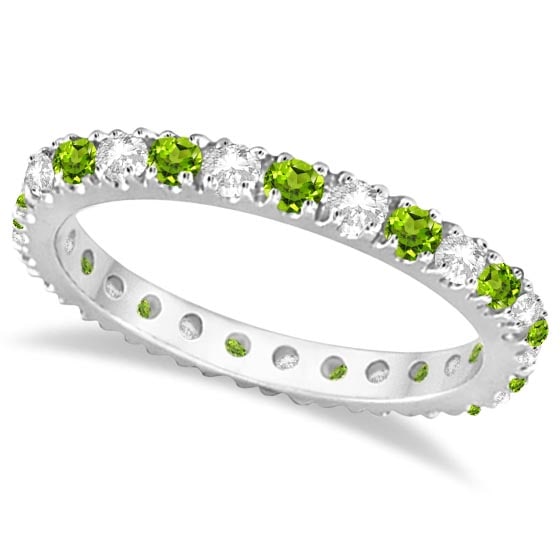 Diamond and Peridot Eternity Ring Stackable Band 14K White Gold 0.64ctw: CENTER STONE; Peridot CENTER STONE CLARITY; CENTER STONE COLOR; Green CENTER STONE SETTING; Prong SIDE STONE CLARITY; SI SIDE STONE COLOR; J-K SIDE STONE SETTING; Prong ctw OF SIDE STONE: 0.25 SIDE ST