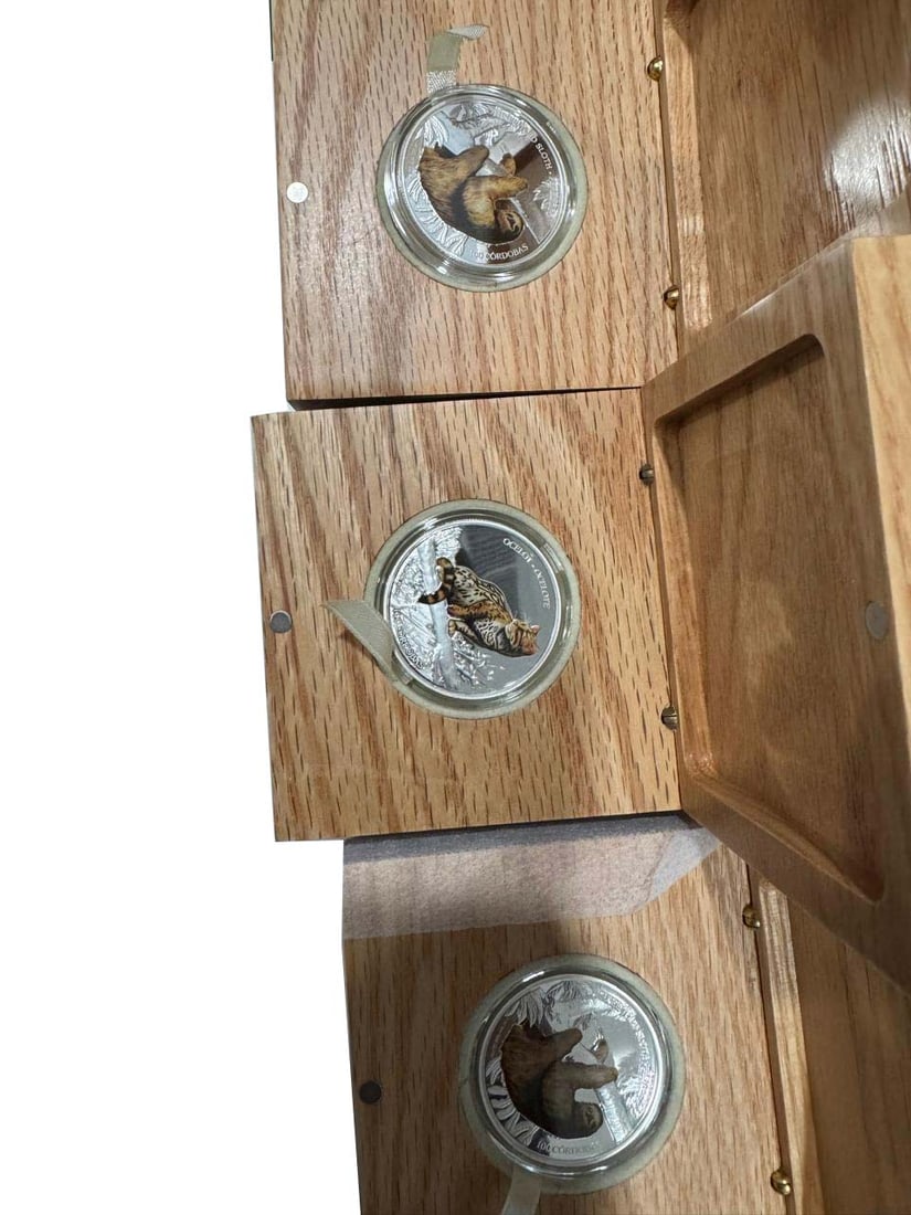 Nicaragua 1 oz Silver Coin 100 C?rdobas Wildlife: Sloth ,solitary wild cat: Nicaragua 1 oz Silver Coin 100 C?rdobas Wildlife: Sloth ,solitary wild cat ( Pack of 3pec ) #PAPPS98490v15