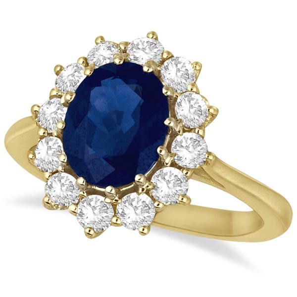 Oval Blue Sapphire and Diamond Accented Ring 14k Yellow Gold 3.60ctw: CENTER STONE; Sapphire CENTER STONE CLARITY; Eye Clean #SI CENTER STONE COLOR; Blue CENTER STONE SETTING; Prong SIDE STONE CLARITY; SI1-SI2 SIDE STONE COLOR; J-K SIDE STONE SETTING; Prong ctw OF SIDE