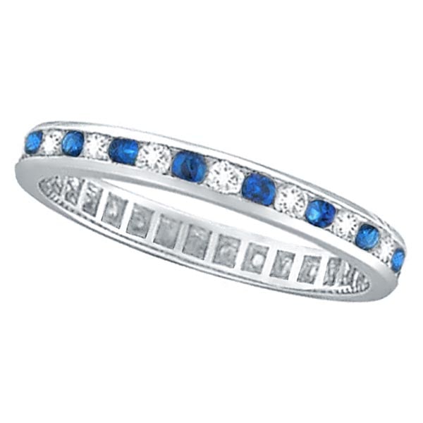 1.04ctw Blue Sapphire and Diamond Channel Set Eternity Band 14k Gold Ring: CENTER STONE; Diamond CENTER STONE CLARITY; SI CENTER STONE COLOR; J-K CENTER STONE SETTING; Channel SIDE STONE CLARITY; SIDE STONE COLOR; Blue SIDE STONE SETTING; Channel ctw OF SIDE STONE: 0.54 SIDE