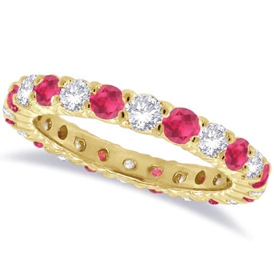 Ruby and Diamond Eternity Ring Band 14k Yellow Gold 1.07ctw: CENTER STONE; Ruby CENTER STONE CLARITY; CENTER STONE COLOR; Red CENTER STONE SETTING; Prong SIDE STONE CLARITY; SI SIDE STONE COLOR; J-K SIDE STONE SETTING; Prong ctw OF SIDE STONE: 0.5 SIDE STONE QU