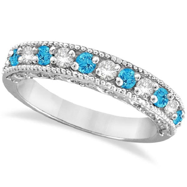 Blue Topaz and Diamond Band Filigree Ring Design 14k White Gold 1.60ctw: CENTER STONE; Blue Topaz CENTER STONE CLARITY; CENTER STONE COLOR; Blue CENTER STONE SETTING; Prong SIDE STONE CLARITY; SI SIDE STONE COLOR; J-K SIDE STONE SETTING; Prong ctw OF SIDE STONE: 0.80 SIDE