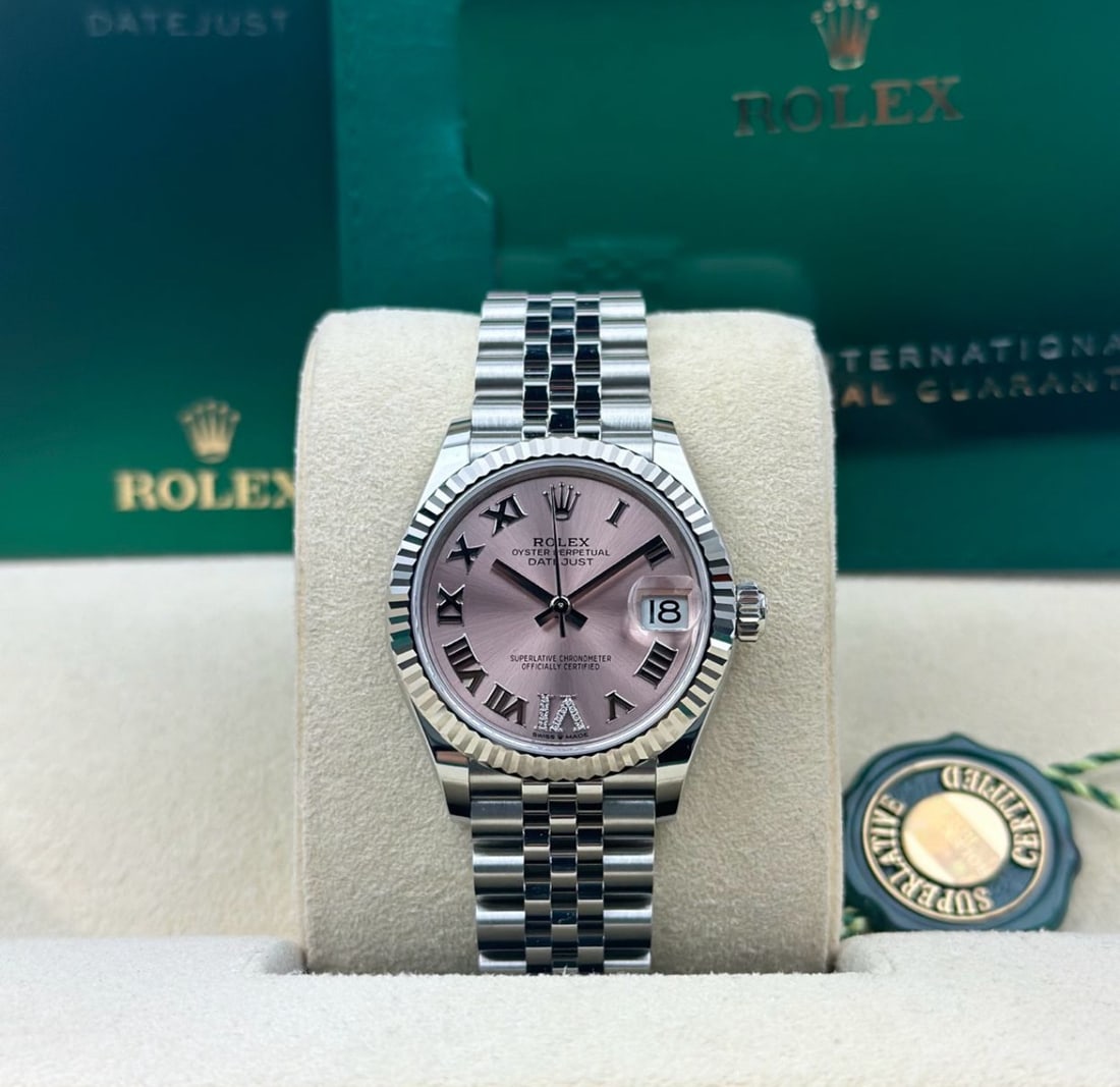 31mm Fluted Pink Dial Jubileee Oysterperpetual Rolex Ref 278274 Comes with: 31mm Fluted Pink Dial Jubileee Oysterperpetual Rolex Ref 278274 Comes with Box & Papers #PAPPS23506v15