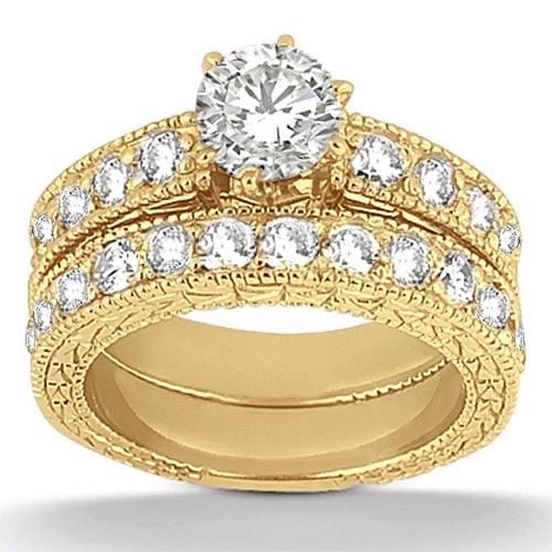 Diamond Engagement Ring 14 K YELLOW GOLD 1.90ctw: CENTER STONE; DIAMOND 1.00 CTW CENTER STONE CLARITY; SI1-SI2 CENTER STONE COLOR; J-K CENTER STONE SETTING; SIDE STONE CLARITY; SI1-SI2 SIDE STONE COLOR; J-K SIDE STONE SETTING; Micro Pave ctw OF SIDE