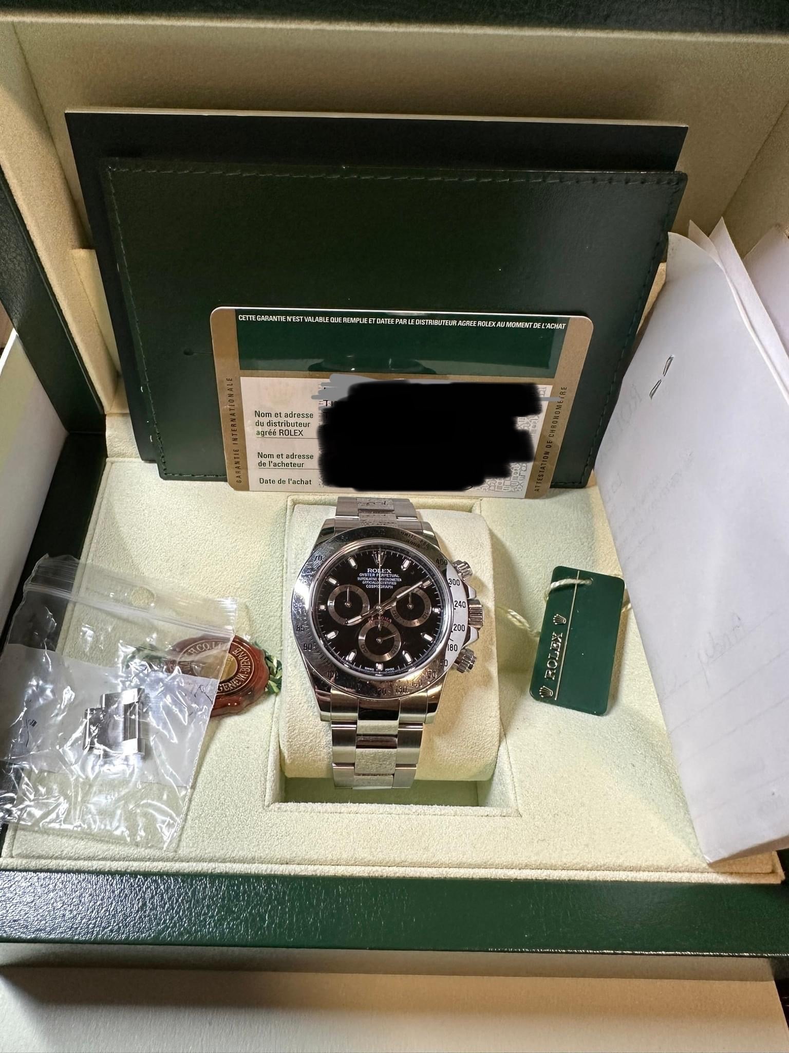 Pre-Owned 40mm Daytona Rolex Black Dial comes with box and papers (1 of 1)