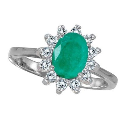 Lady Diana Oval Emerald and Diamond Ring 14k White Gold 1.50 ctw: CENTER STONE; Emerald CENTER STONE CLARITY; CENTER STONE COLOR; CENTER STONE SETTING; Prong SIDE STONE CLARITY; SI SIDE STONE COLOR; J-K SIDE STONE SETTING; Prong ctw OF SIDE STONE: 0.3 SIDE STONE