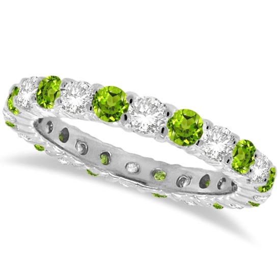 Peridot and Diamond Eternity Ring Band 14k White Gold 1.07ctw: CENTER STONE; Peridot CENTER STONE CLARITY; CENTER STONE COLOR; Green CENTER STONE SETTING; Prong SIDE STONE CLARITY; SI SIDE STONE COLOR; J-K SIDE STONE SETTING; Prong ctw OF SIDE STONE: 0.5 SIDE
