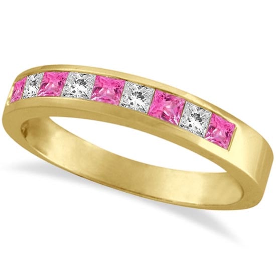 Princess Channel-Set Diamond and Pink Sapphire Ring Band 14k Yellow Gold: CENTER STONE; Sapphire CENTER STONE CLARITY; CENTER STONE COLOR; Pink CENTER STONE SETTING; Channel SIDE STONE CLARITY; SI SIDE STONE COLOR; J-K SIDE STONE SETTING; Channel ctw OF SIDE STONE: 0.23 SID