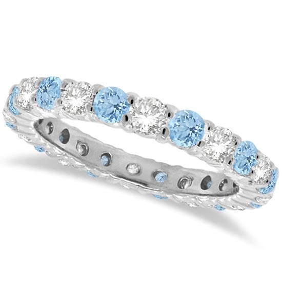 Aquamarine and Diamond Eternity Ring Band 14k White Gold 1.07ctw: CENTER STONE; Aquamarine CENTER STONE CLARITY; CENTER STONE COLOR; Blue CENTER STONE SETTING; Prong SIDE STONE CLARITY; SI SIDE STONE COLOR; J-K SIDE STONE SETTING; Prong ctw OF SIDE STONE: 0.5 SIDE