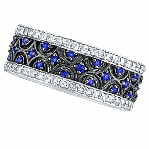 Blue Sapphire and Diamond Eternity Band 14k White Gold 1.23ctw: CENTER STONE; Diamond CENTER STONE CLARITY; SI CENTER STONE COLOR; J-K CENTER STONE SETTING; Prong SIDE STONE CLARITY; SIDE STONE COLOR; Blue SIDE STONE SETTING; Prong ctw OF SIDE STONE: 0.47 SIDE STO