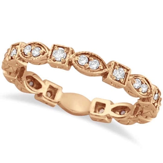 Antique style Style Diamond Eternity Ring Band in 14k Rose Gold 0.36ctw: CENTER STONE; Diamond CENTER STONE CLARITY; SI CENTER STONE COLOR; J-K CENTER STONE SETTING; Prong SIDE STONE CLARITY; SI1-SI2 SIDE STONE COLOR; J-K SIDE STONE SETTING; Prong ctw OF SIDE STONE: 0.14 S