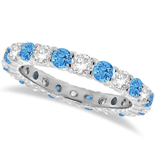 Blue Topaz and Diamond Eternity Ring Band 14k White Gold 1.07ctw: CENTER STONE; Topaz CENTER STONE CLARITY; CENTER STONE COLOR; Blue CENTER STONE SETTING; Prong SIDE STONE CLARITY; SI SIDE STONE COLOR; J-K SIDE STONE SETTING; Prong ctw OF SIDE STONE: 0.5 SIDE STONE 
