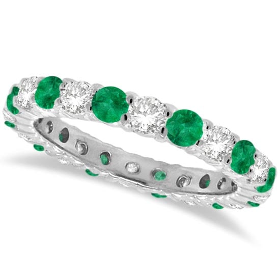Emerald and Diamond Eternity Ring Band 14k White Gold 1.07ctw: CENTER STONE; Emerald CENTER STONE CLARITY; CENTER STONE COLOR; Green CENTER STONE SETTING; Prong SIDE STONE CLARITY; SI SIDE STONE COLOR; J-K SIDE STONE SETTING; Prong ctw OF SIDE STONE: 0.5 SIDE STO