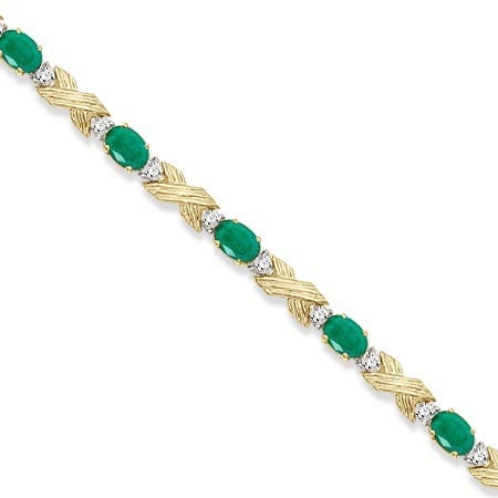 Emerald and Diamond XOXO Link Bracelet in 14k Yellow Gold 6.65ctw: CENTER STONE; Emerald CENTER STONE CLARITY; CENTER STONE COLOR; CENTER STONE SETTING; Prong SIDE STONE CLARITY; SI SIDE STONE COLOR; H SIDE STONE SETTING; Prong ctw OF SIDE STONE: 0.05 SIDE STONE QUAL