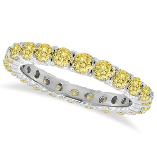 Fancy Yellow Canary Diamond Eternity Ring Band 14k White Gold 1.07 ctw: CENTER STONE; Diamond CENTER STONE CLARITY; SI CENTER STONE COLOR; Yellow CENTER STONE SETTING; Prong SIDE STONE CLARITY; SIDE STONE COLOR; SIDE STONE SETTING; ctw OF SIDE STONE: SIDE STONE QUALITY; #