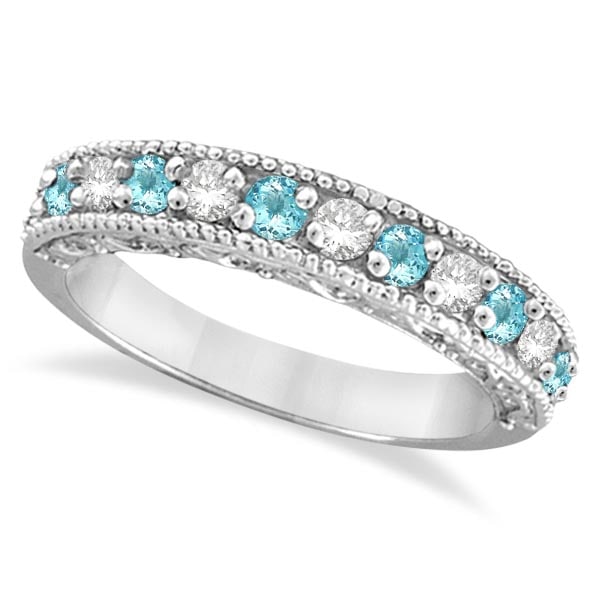 Diamond and Aquamarine Band Filigree Design Ring 14k White Gold 1.00 ctw: CENTER STONE; Aquamarine CENTER STONE CLARITY; CENTER STONE COLOR; CENTER STONE SETTING; Prong SIDE STONE CLARITY; SI SIDE STONE COLOR; J-K SIDE STONE SETTING; Prong ctw OF SIDE STONE: 0.23 SIDE STONE