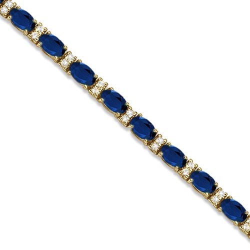 Diamond and Oval Cut Sapphire Tennis Bracelet 14k Yellow Gold 9.25ctw: CENTER STONE; Sapphire CENTER STONE CLARITY; CENTER STONE COLOR; Blue CENTER STONE SETTING; Prong SIDE STONE CLARITY; SI SIDE STONE COLOR; J-K SIDE STONE SETTING; Prong ctw OF SIDE STONE: 0.5 SIDE STO