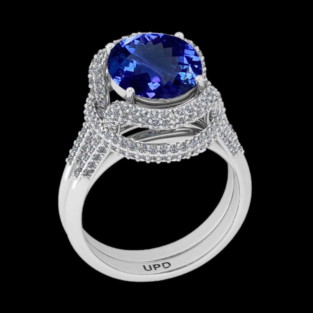 6.87 Ctw VS/SI1 Tanzanite and Diamond 14K White Gold Vintage Style Ring: Center Stone Weight : 5.53 Ctw ( Oval Cut) Center stone Color :-Tanzanite Center Stone Setting : Prong Side Stone Weight Of Ctw 1.34 Ctw Side Stone Color : J-K Stone Clarity : VS/SI1 Stone Setting : P