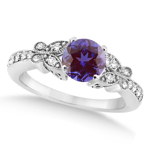 Butterfly Alexandrite and Diamond Engagement Ring 14K W. Gold 1.23ctw: CENTER STONE; Alexandrite (1.00 CTW) CENTER STONE CLARITY; Eye Clean CENTER STONE COLOR; Purple CENTER STONE SETTING; Prong SIDE STONE CLARITY; SI1-SI2 SIDE STONE COLOR; J-K SIDE STONE SETTING; Pave c