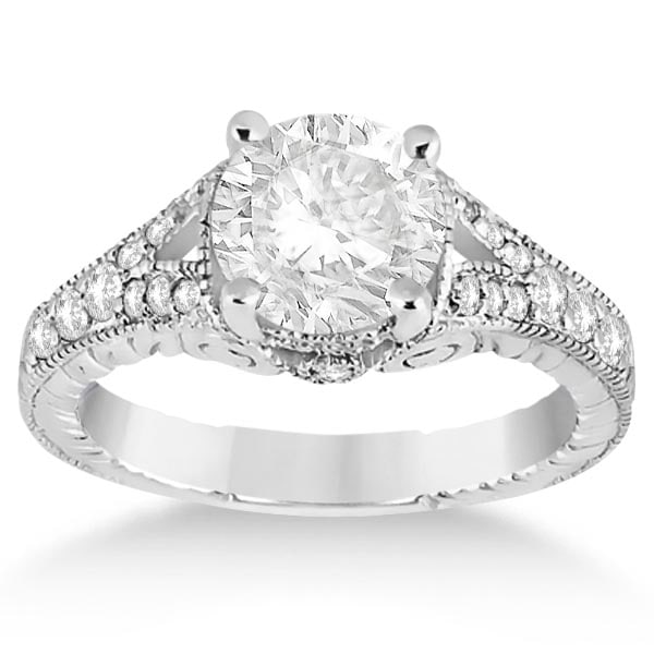 Antique style Style Art Deco Diamond Engagement Ring Platinum 1.33ctw: CENTER STONE; DIAMOND 1.00 CTW CENTER STONE CLARITY; SI1-SI2 CENTER STONE COLOR; J-K CENTER STONE SETTING; SIDE STONE CLARITY; SI1-SI2 SIDE STONE COLOR; J-K SIDE STONE SETTING; Pave ctw OF SIDE STONE: